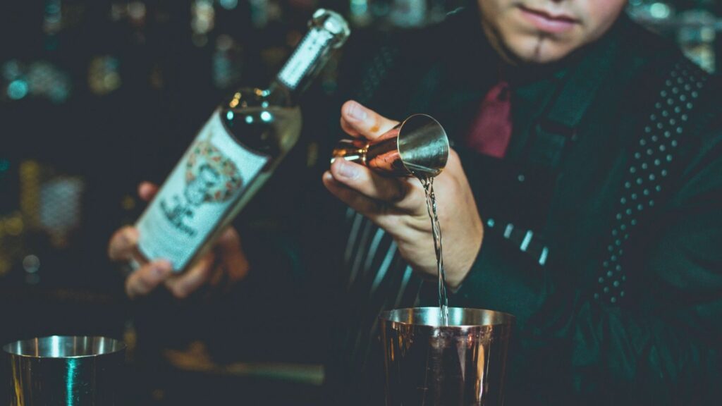 Barman mixing a cocktail