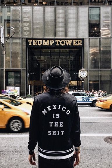 Guy in NYC standing in front of the Trump Tower